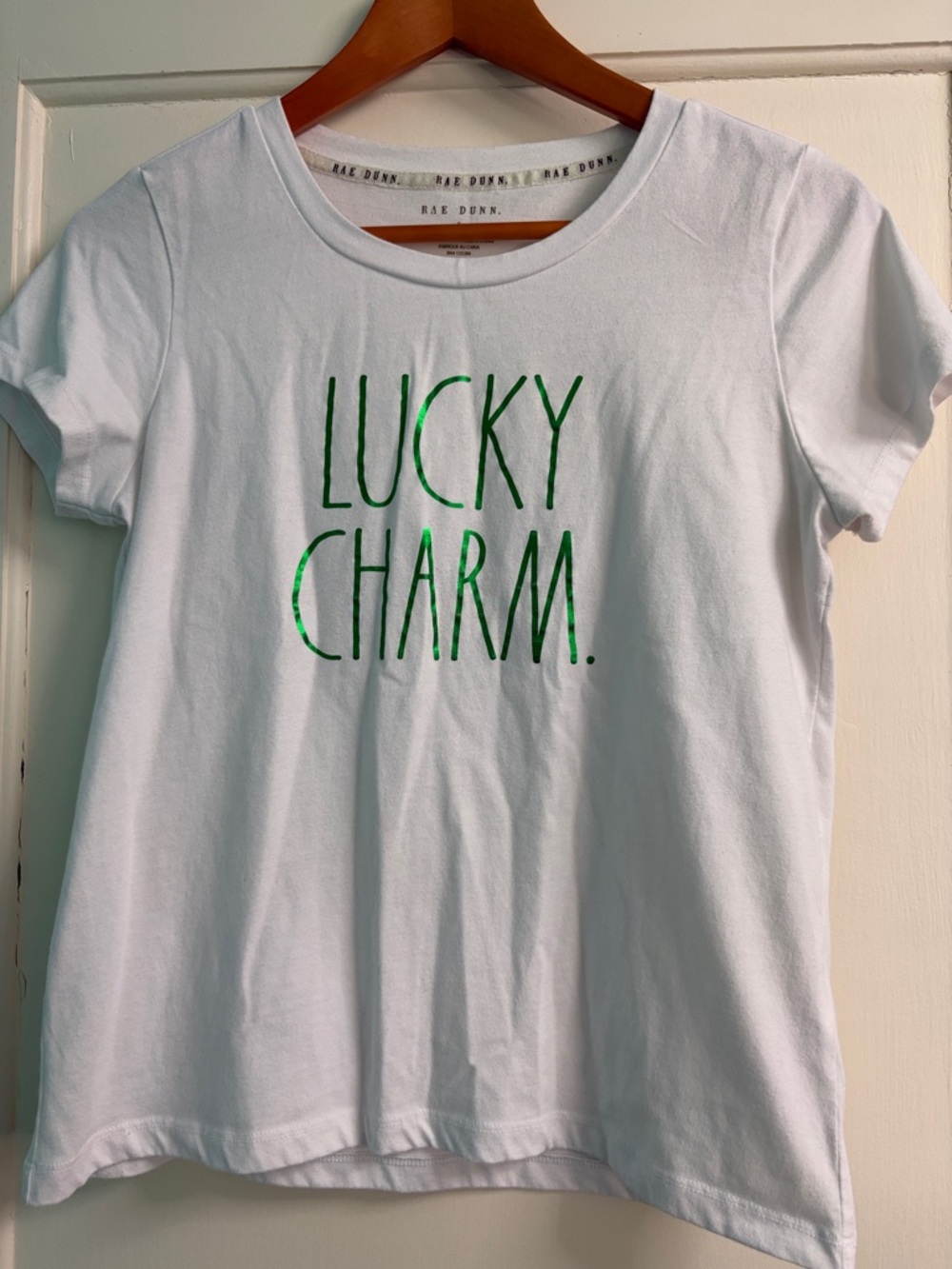 Rae Dunn White Tee with Shiny Green "Lucky Charm" Graphic